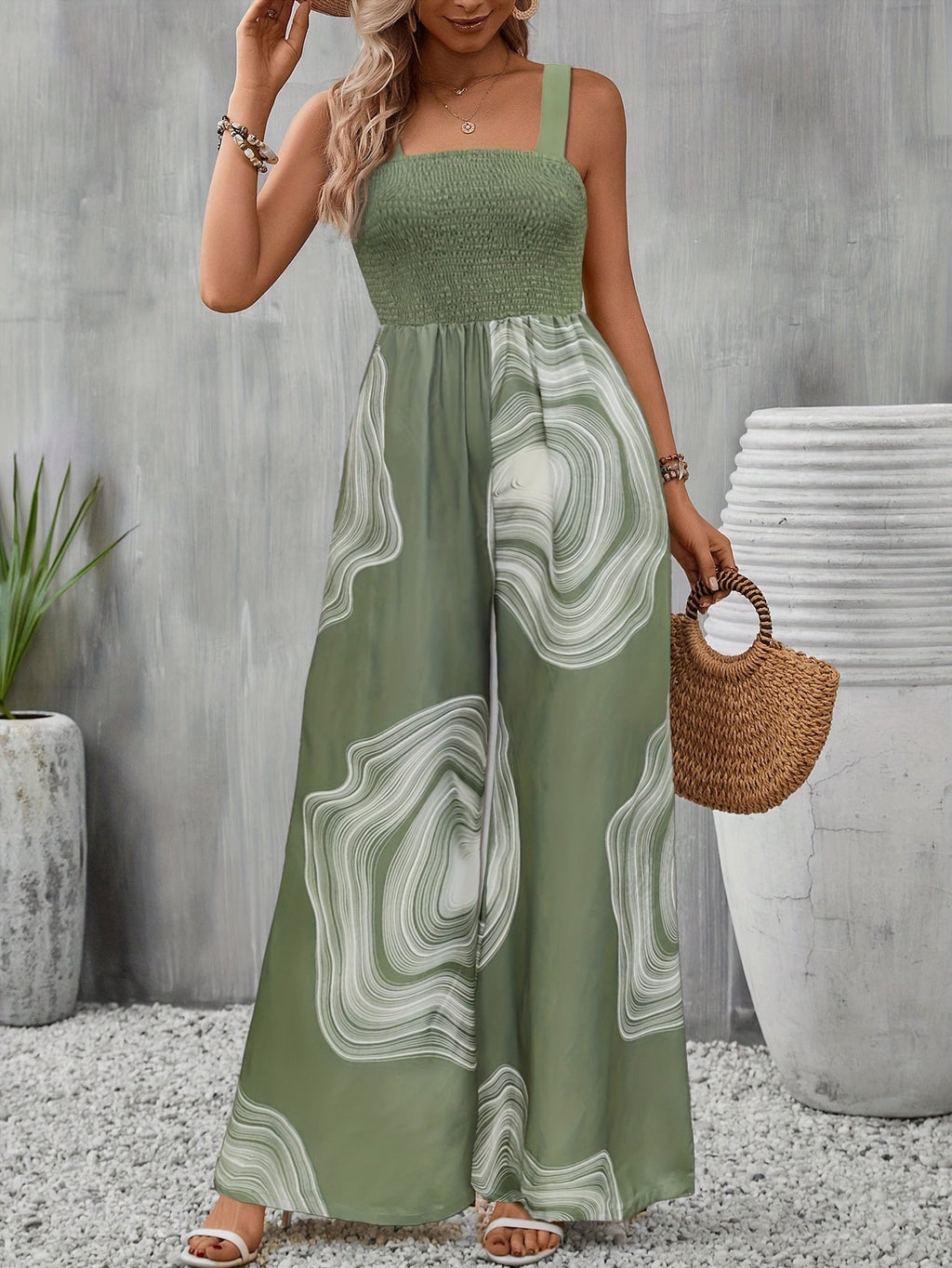Giacca jumpsuit rotonda con scollo quadrato, senza maniche, pantaloni larghi e tasche, in tessuto shirred, marca Valstrend.