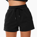 Pantaloncini sportivi morbidi con coulisse per donna, modello ampio e comodo, marca Valstrend shop.