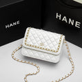 Borsa a tracolla in stile classico con motivo a rombi, un solo spallaccio, brand Valstrend, design alla moda e moderna.