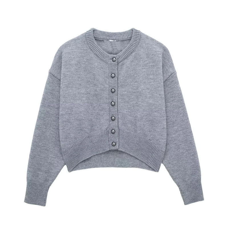 Cappotto donna grigio a vita alta con bottoni decorativi e maglia, stile corto, marchio Valstrend, dettaglio tessuto e design.