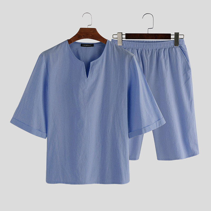 Pantaloni pigiama da uomo in cotone Valstrend, morbidi e comodi, con stampa a righe blu e bianco, visibili in primo piano.