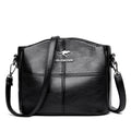 Borsa a tracolla patchwork Valstrend, spalla, in tessuto colorato con dettagli unici e tracolla regolabile.