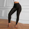 Leggings sportivi neri a vita alta Valstrend, aderenti e elasticizzati, ideali per allenamento e attività fitness.
