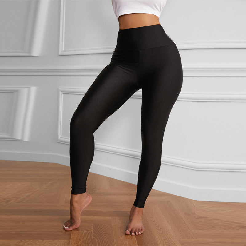 Leggings sportivi neri a vita alta Valstrend, aderenti e elasticizzati, ideali per allenamento e attività fitness.