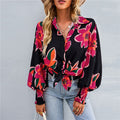 Blusa donna Valstrend con stampa, maniche bishop lunghe, colletto a rever e stile fashion elegante.