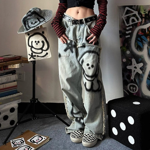 Jeans larghi da donna Valstrend shop con stampa graffiti retrò Y2K, stile casual e alla moda, visibili nella foto.