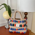 Borsa a tracolla in peluche Valstrend, spaziosa e portatile, con design a secchiello e manico a spalla, morbida e colorata.