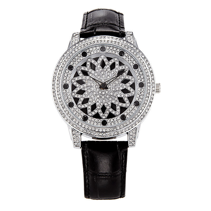 Orologio rotante da donna Valstrend Shop, orologio con simbolo della fortuna e design elegante, visibile in dettaglio.