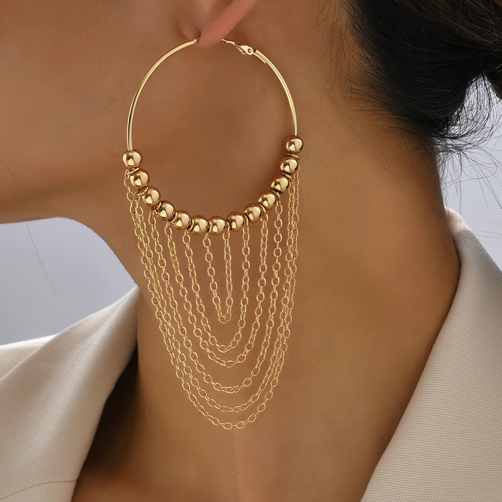 Orecchini a cerchio con nappina dorata Golden Circle Tassel di Valstrend, placcati oro 18 carati, con ornamenti pendenti eleganti