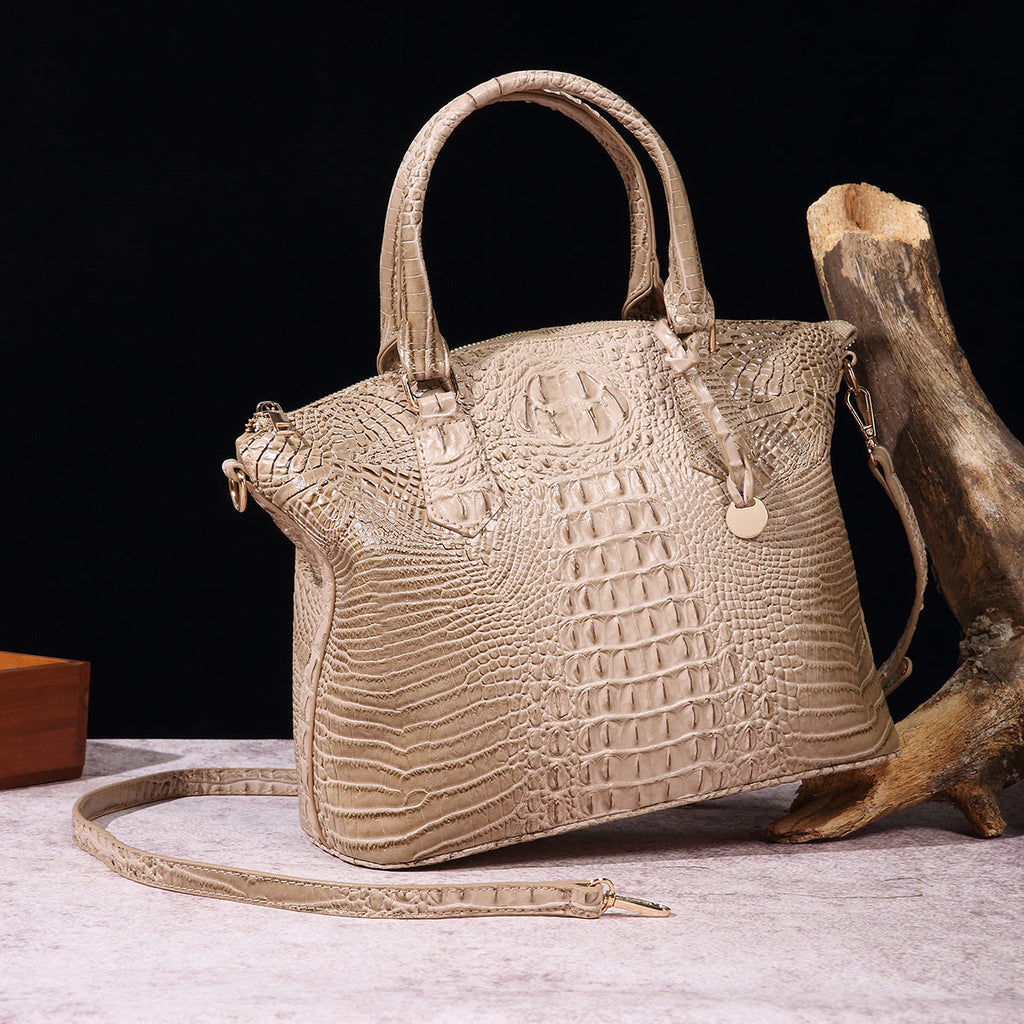 Borsa a tracolla donna Valstrend con motivo rettile retrò, portatile e spaziosa, in ecopelle con design elegante e pratico.