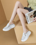 Ciabatte da donna in pelle con suola spessa, stile metà slippers Valstrend, morbide e comode per il comfort quotidiano.