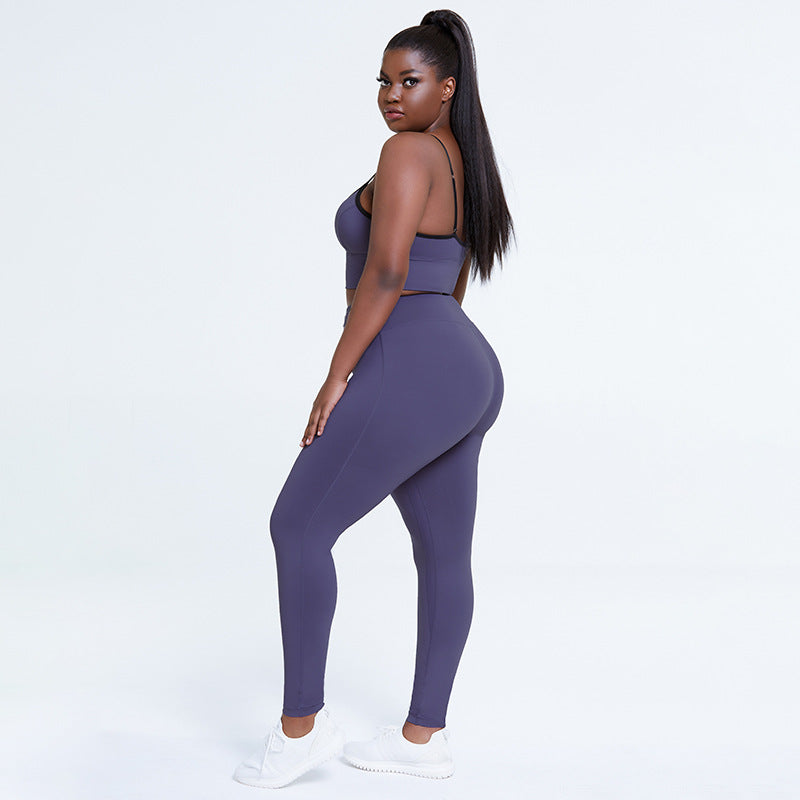 Completo di abbigliamento yoga donna, reggiseno e pantaloni a vita alta in tessuto solido, indicato per bodybuilding e fitness.