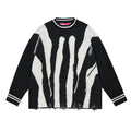 Maglione oversize Valstrend con motivo astratto a righe irregolari, frange e stile casual, ideale per un look moderno e comodo.