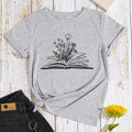 T-shirt donna Valstrend con stampa floreale, maniche corte, collo rotondo e vestibilità ampia in cotone leggero.