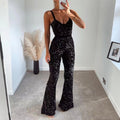 Salopette donna Valstrend con paillettes, bretelle decorative, gamba ampia e stile alla moda, ideale per occasioni speciali.