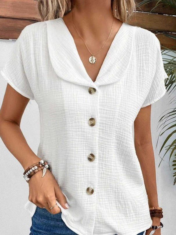 Cardigan estivo a maniche corte colorato, con bottoni, stile femminile, marca Valstrend, indossato come top moda.