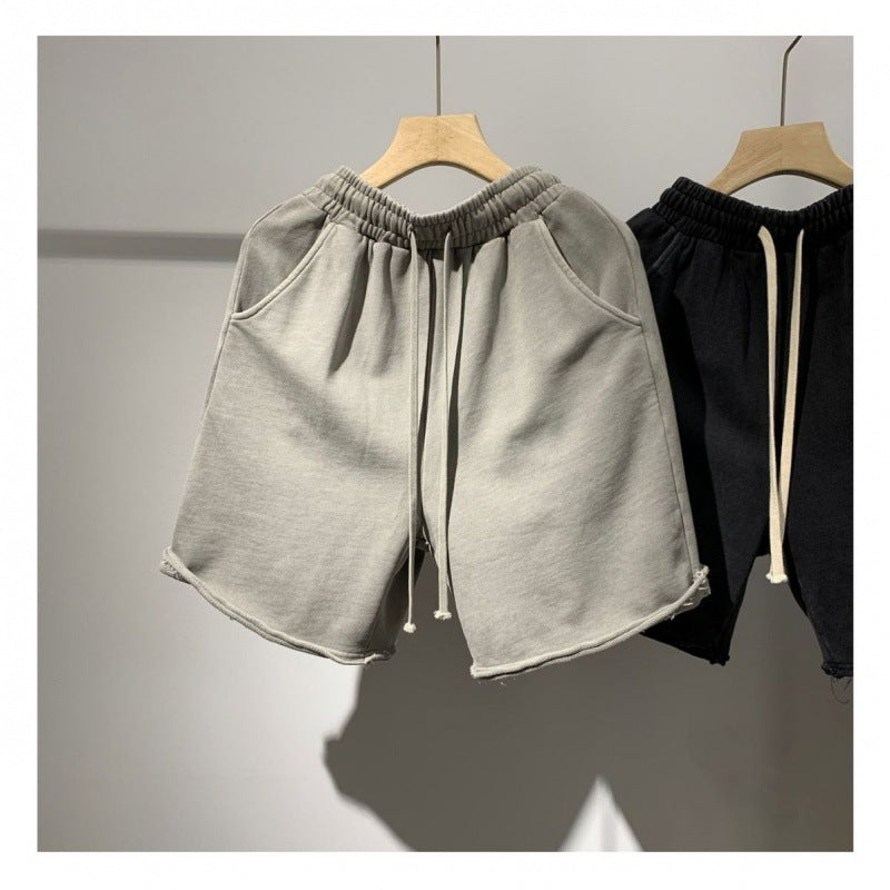 Pantaloncini sportivi da uomo in cotone lavato Valstrend, morbidi e leggeri, con vita elastica e cuciture resistenti.