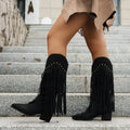 Stivali donna Valstrend con tacco grosso a punta e altezza sopra il ginocchio, stile all-match, in pelle nera.