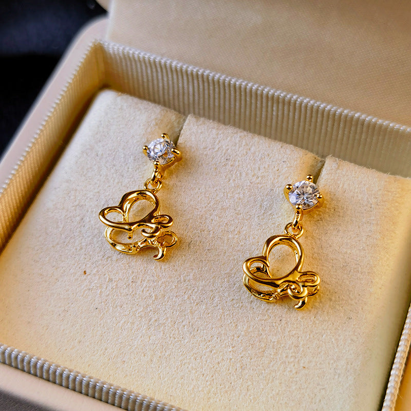 Orecchini a perno con diamanti lucidi e pendente cartone vuoto, stile brillante e originale, brand Valstrend shop