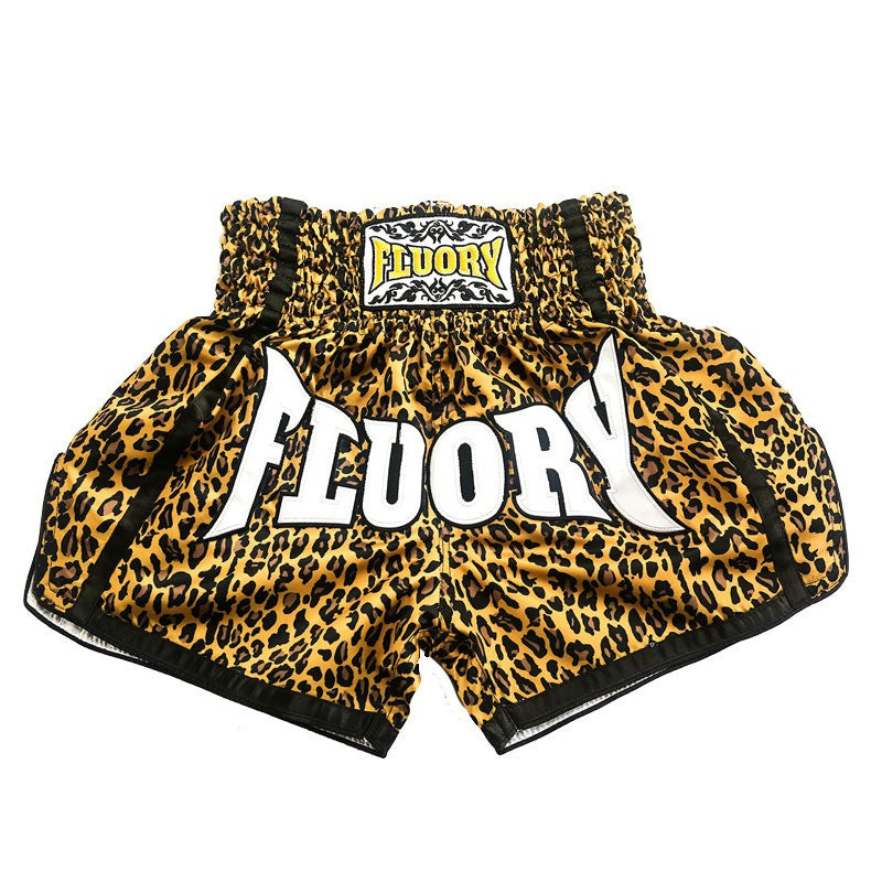 Pantaloncini Muay Thai con stampa leopardata per uomo e donna, abbigliamento sportivo Valstrend, dettagli di allenamento.