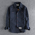 Camicia lunga da uomo Valstrend in tessuto pesante con ricami sulla schiena, maniche lunghe e stile elegante.