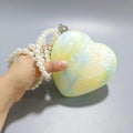Borsa femminile creativa in acrilico a forma di cuore, moda Valstrend, design originale e colorato per donne moderne.