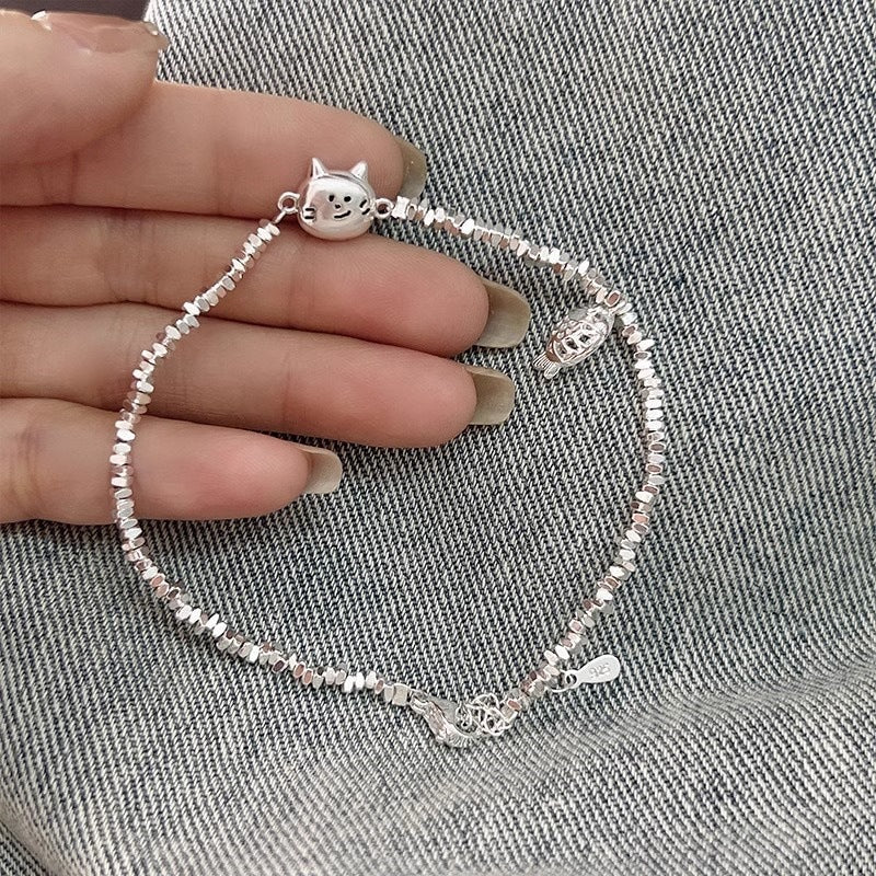 Bracciale in argento con piccoli pezzi di design a forma di pesce, di un anno, marca Valstrend shop