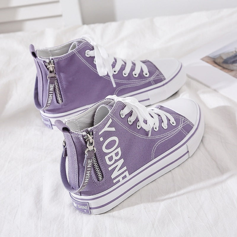 Scarpe alte in canvas per donna Valstrend, design moderno con suola bianca e dettagli colorati, perfette per un look casual.