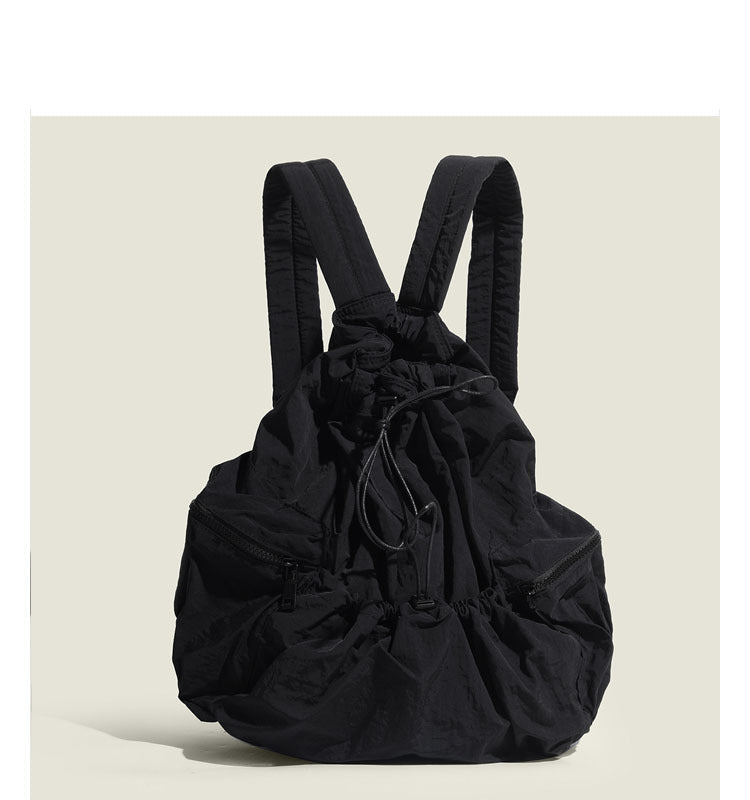 Zaino scolastico grande in nylon e tela canvas Valstrend, con scomparti casual e versatile, tasche plissettate.
