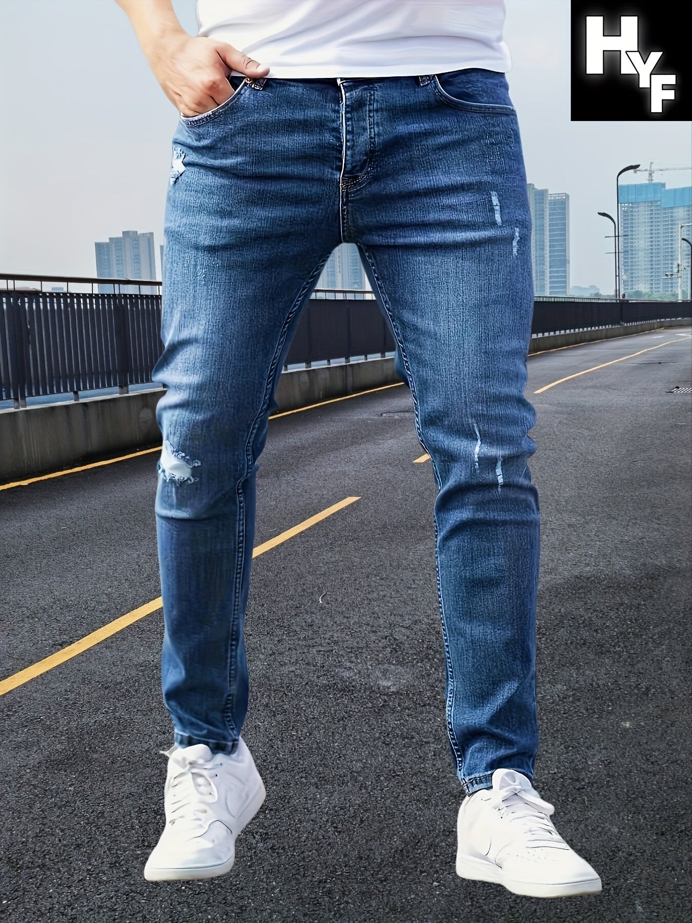 Jeans slim fit da uomo Valstrend con strappi, tasche, vita media e tessuto elasticizzato, lavabile in lavatrice.