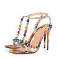 Sandali T-strap trasparenti in PVC colorati con tacco sottile alto, stile elegante e moderno, marca Valstrend shop