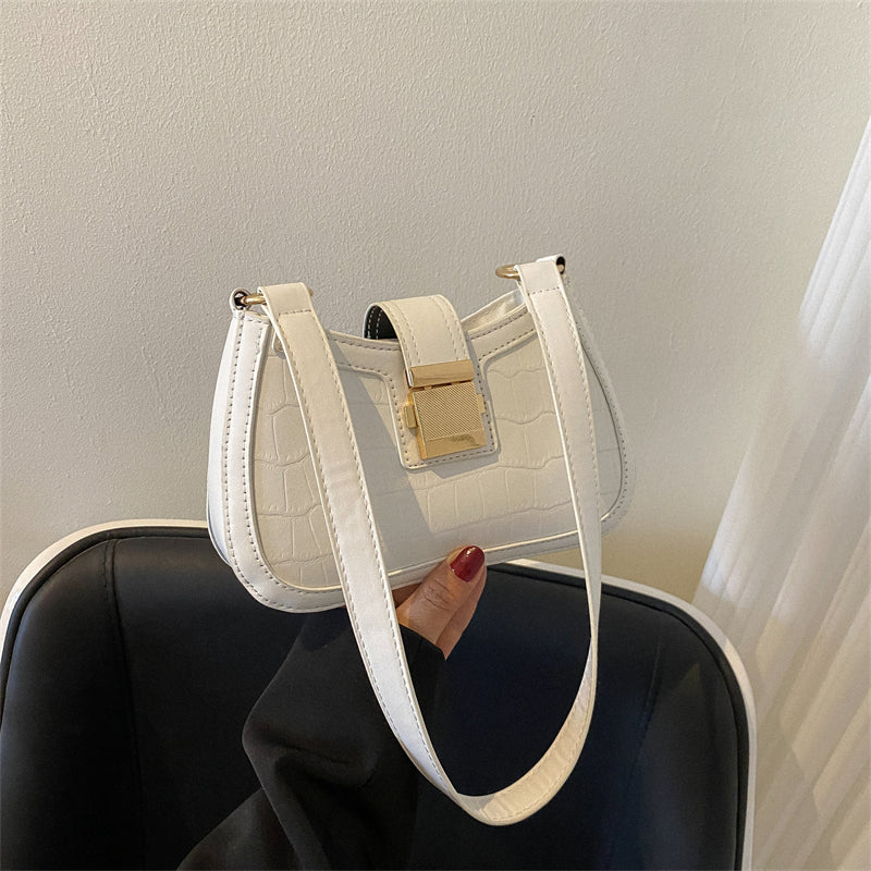 Borsa tracolla casual piccola Valstrend in tinta unita, forma quadrata, con manico sottobraccio e design semplice.