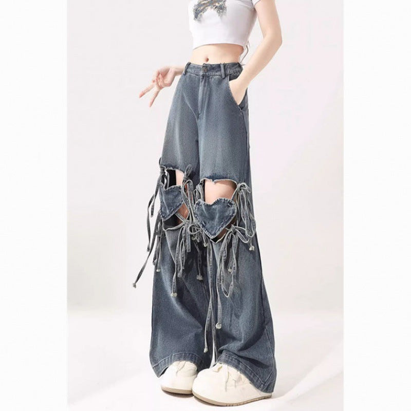 Jeans donna a vita alta Valstrend con design a spalline e dettagli eleganti, ideali per uno stile alla moda e femminile.