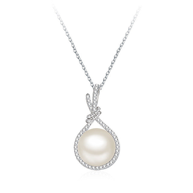 Collana con pendente di perle di conchiglia naturale e bianca, gioiello elegante Valstrend shop con perle di lusso e stile raffinato