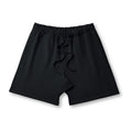 Pantaloncini sportivi larghi da uomo Valstrend, stile street europeo e americano, tessuto leggero e comodo, vista frontale.