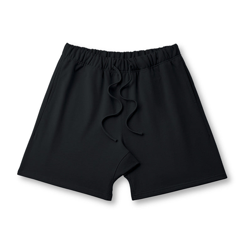 Pantaloncini sportivi larghi da uomo Valstrend, stile street europeo e americano, tessuto leggero e comodo, vista frontale.