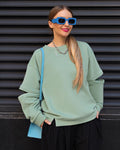Felpa donna con scollo rotondo, stampa colorata, vestibilità ampia, marca Valstrend, tessuto morbido e comodo.