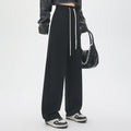 Pantaloni casual a vita alta in cotone Valstrend, taglio morbido, a gamba dritta e svasata, ideale per un look comodo e alla moda