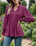 Blusa donna a righe Valstrend con maniche a sbuffo e scollo a V, tessuto leggero e stile elegante.