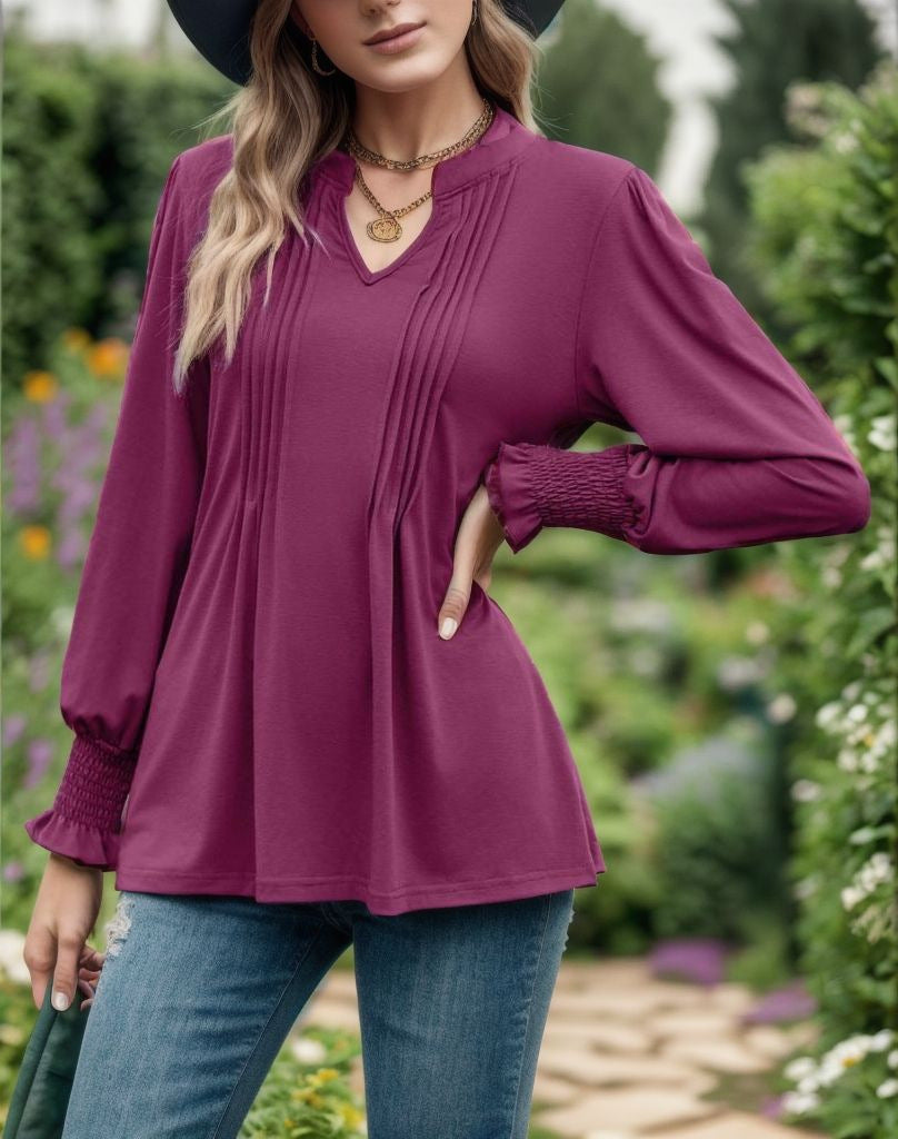 Blusa donna a righe Valstrend con maniche a sbuffo e scollo a V, tessuto leggero e stile elegante.