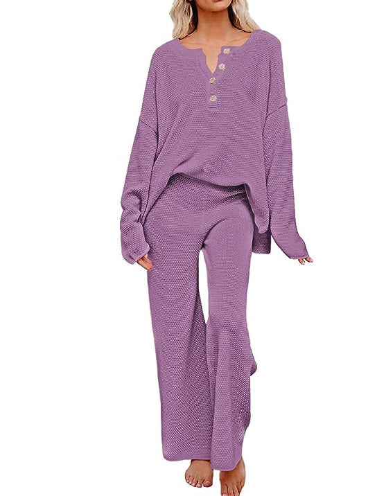 Completo donna in tinta unita, vestito casual e comodo Valstrend, giacca e pantaloni larghi per look rilassato.