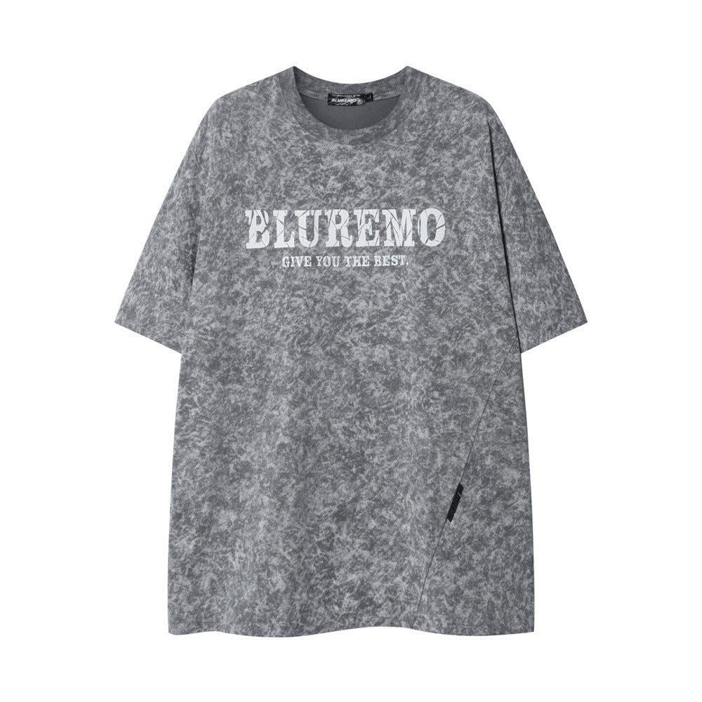 Maglietta a maniche corte Valstrend con stampa floreale fritta e lettering, stile fashion, vista frontale.