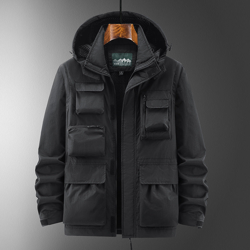Giacca da campeggio con cappuccio, maniche corte e tessuto quick-drying, shell Valstrend, con tasche multiple.