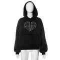 Maglione con cappuccio sciolto con scheletro in strass di Valstrend, stile trendy e dettagli scintillanti in nero e bianco