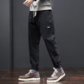 Pantaloni boy lavare morbido a taglio largo e tapered, marchio Valstrend shop, vista frontale con dettagli del tessuto.