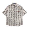 Camicia corta a righe verticali con piccoli fiori, maniche corte e vestibilità morbida, marca Valstrend shop.