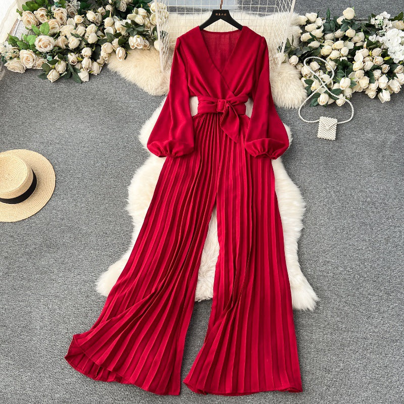 Tuta donna con maniche a sbuffo, stile europeo e americano, marca Valstrend, in tessuto leggero e di tendenza.