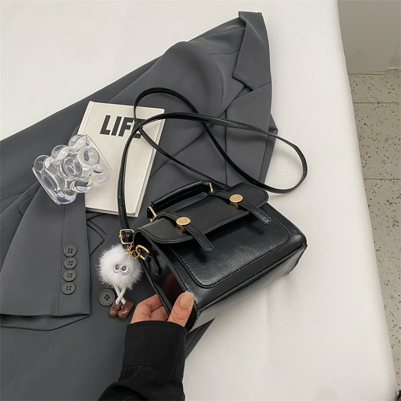 Borsa a tracolla casual da donna Valstrend, semplice e elegante, con dettagli minimalisti e tracolla regolabile.