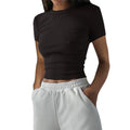 T-shirt donna basic in stile a coste Valstrend, tessuto morbido e comodo, colore neutro, vista frontale