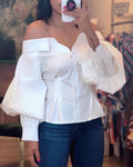 Camicia donna nera senza spalline con maniche a lanterna e scollo a cuore, stile elegante e moderno, marca Valstrend.